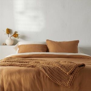 50"×70" Oversized Solid Bed Throw Warm
Brown - Casaluna